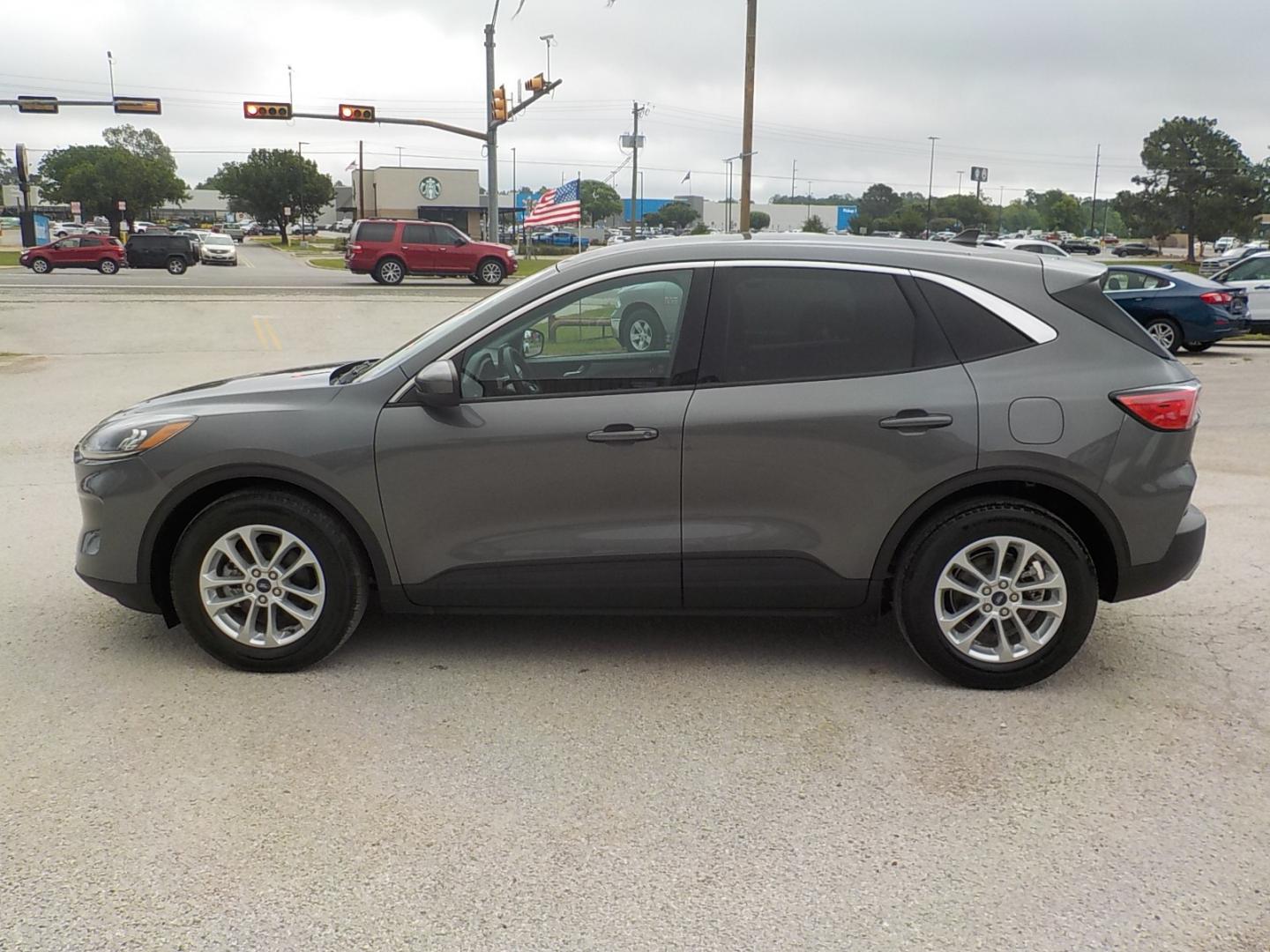 2021 Gray /Lt gray Ford Escape (1FMCU0G66MU) , Auto transmission, located at 1617 W Church Street, Livingston, TX, 77351, (936) 327-3600, 30.710995, -94.951157 - These vehicles get over 30 mpg on the highway!! - Photo#4